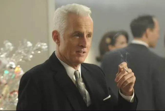 Mad Men - Roger Sterling holding a cigarette
